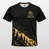 T-shirt technique Academy Ninja noir et or, face avant avec logo et montagne au torii dorée